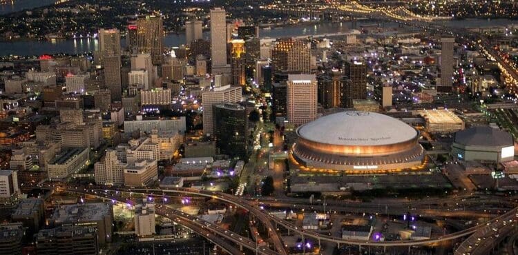 New Orleans skyline at dusk with the Superdome and downtown